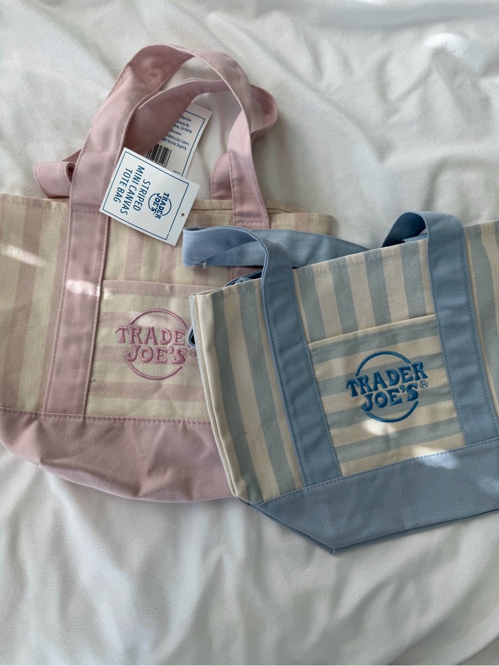 Trader Joe’s bags pink and blue